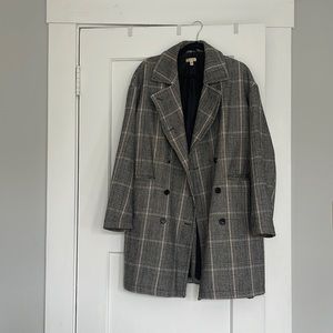 Plaid wool coat with hints of black gray and light pink. Double breasted buttons